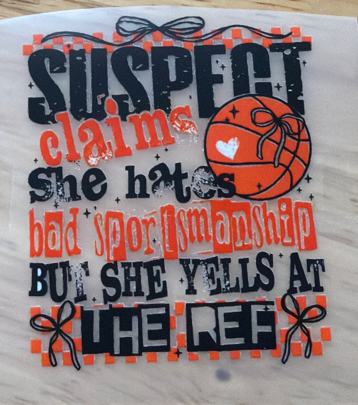 Suspect Claims She Hates Bad Sportsmanship Trucker Hat