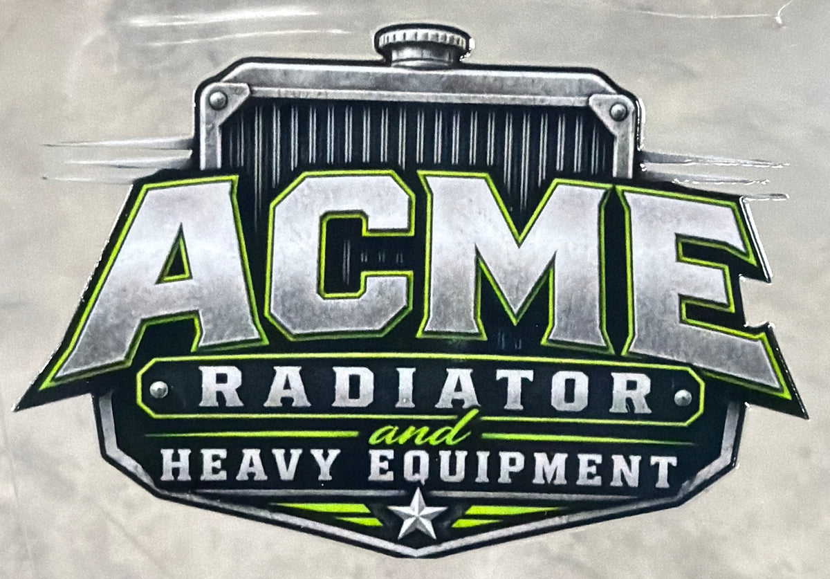 A close-up of a decal sticker featuring the 'ACME Radiator and Heavy Equipment' logo.