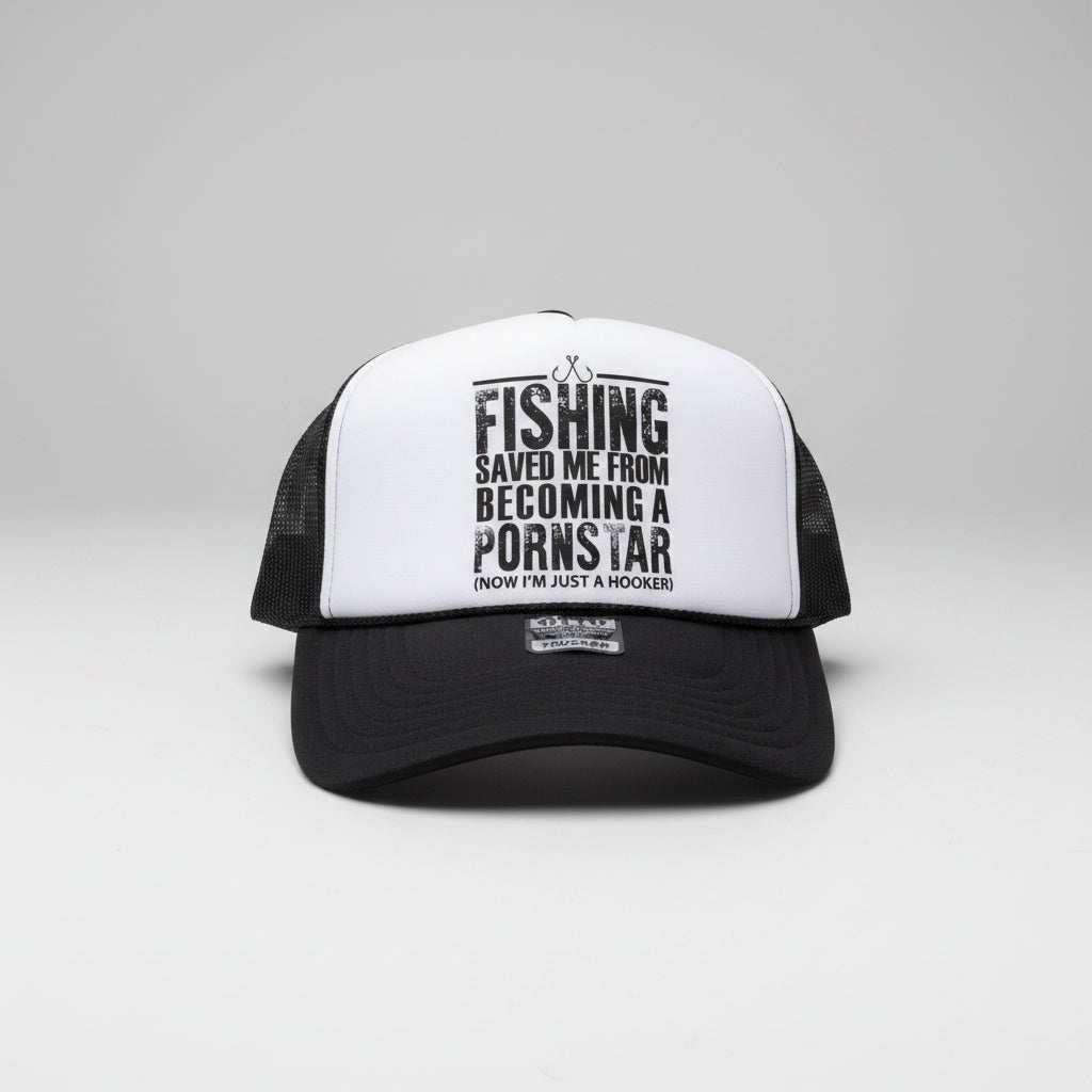A black and white trucker hat with a red mesh back, featuring a bold black text graphic on the white front panel that reads 'FISHING SAVED ME FROM BECOMING A PORN STAR (NOW I'M JUST A HOOKER)'.