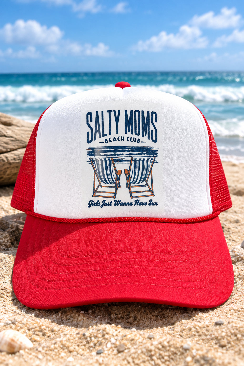 A red and white trucker hat with a white front panel featuring a 'Salty Moms Beach Club' graphic. The brim is bright red with a white and red 'OTTO' foam closure sticker.