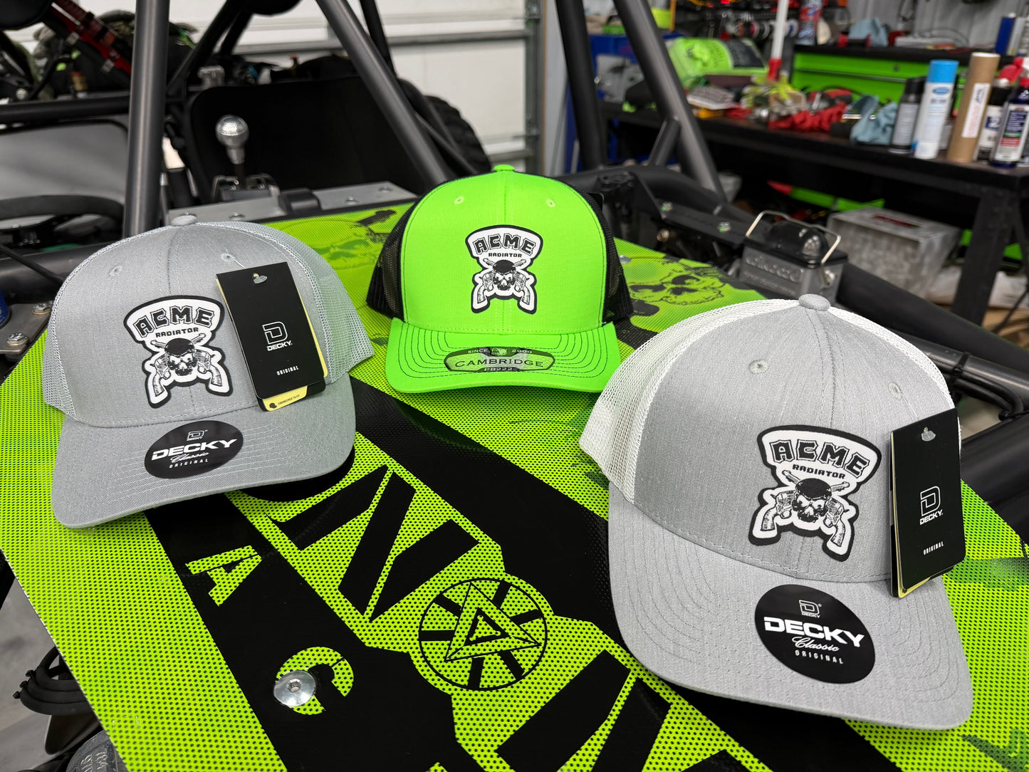 ACME Radiator Skull & Guns Woven Patch on the Pit Bull Cambridge Neon Trucker Hat