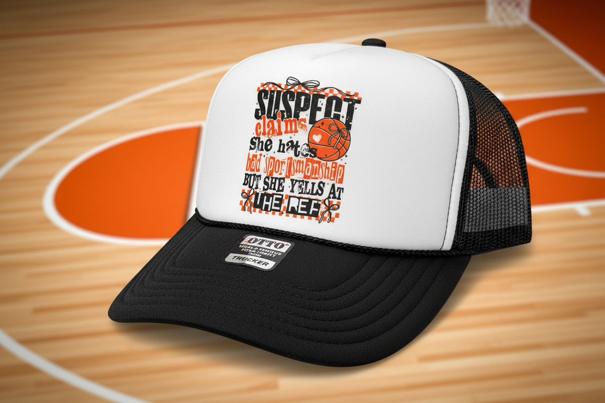 Suspect Claims She Hates Bad Sportsmanship Trucker Hat