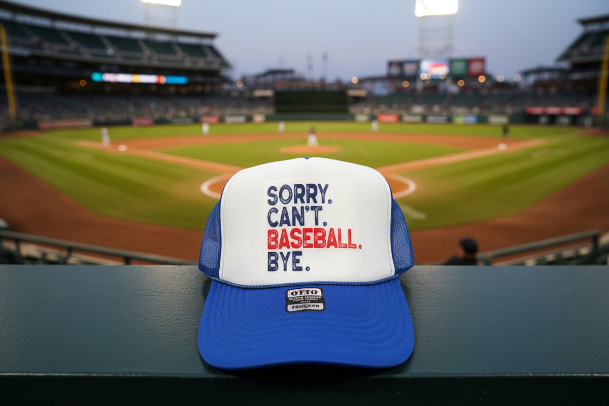 A blue and white trucker hat with the text 'SORRY. CAN'T.