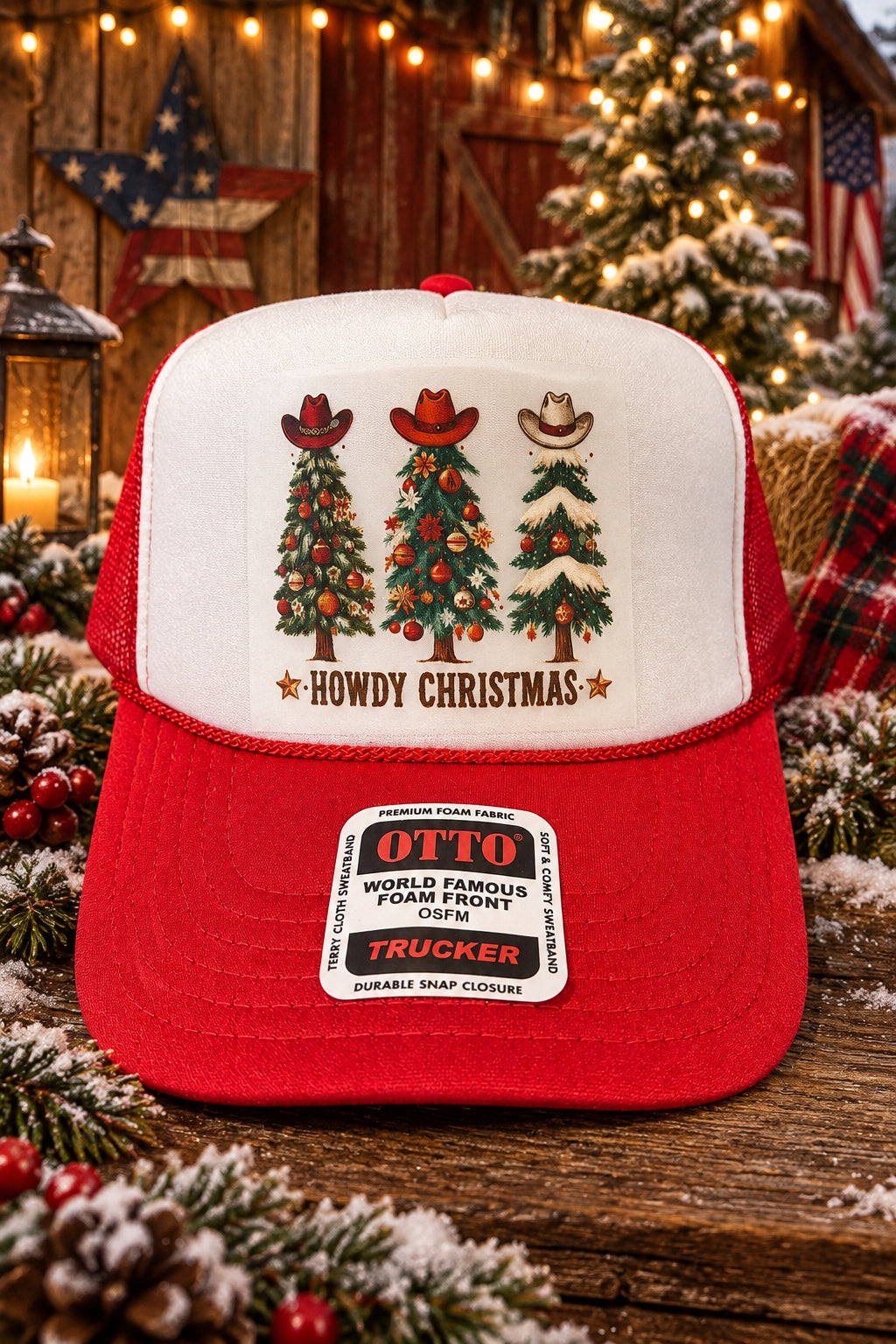 A red and white trucker hat with a Christmas-themed graphic on the front panel showing three decorated Christmas trees under cowboy hats and the text 'HOWDY CHRISTMAS'. The brim has a visible 'OTTO' brand sticker.